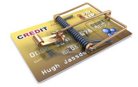 Kreditkarte mit einer Mausefalle abgesichert